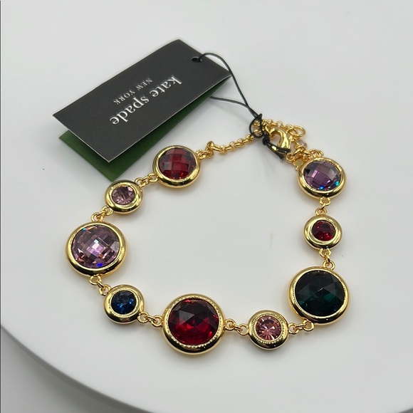 293. Kate Spade Gold‎ Bracelet with Red and Purple Gems